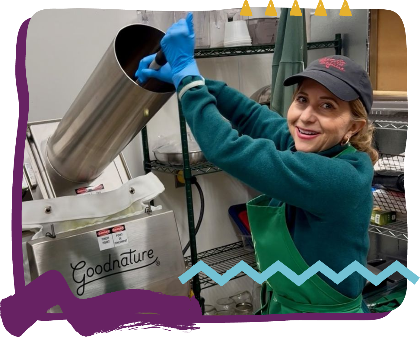 Carmen in a kitchen or food processing facility using a machine labeled 'Goodnature'.